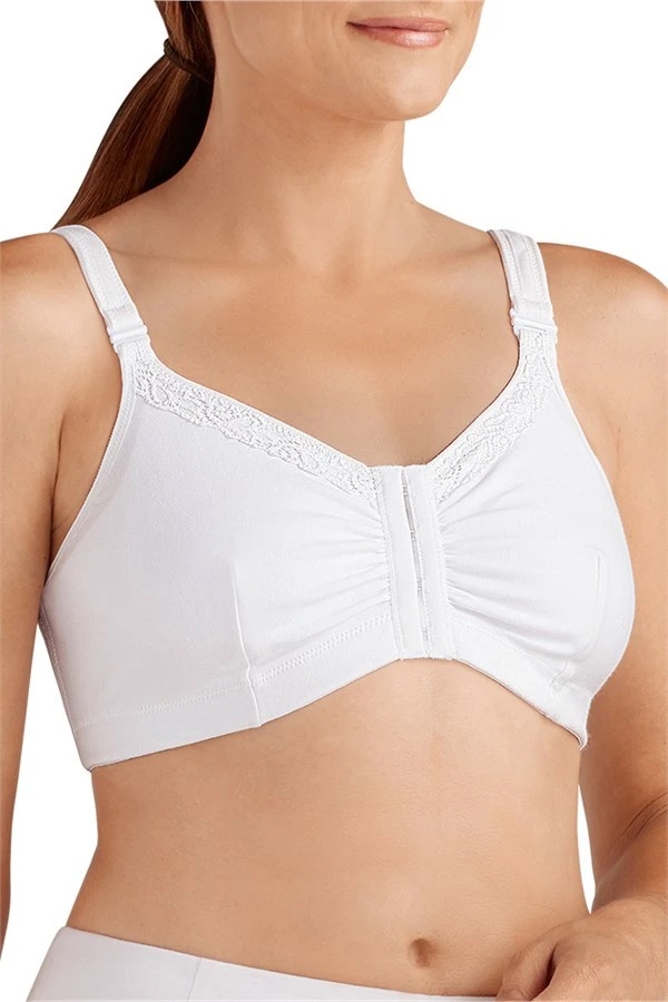 White bra on orange background.Concept, feminine brassiere. Classic  comfortable with cup A for female young teenagers. Protect and hold  beautiful breasts. Breast cancer awareness. 35746274 Stock Photo at Vecteezy